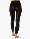 Back look at the Beyond Yoga Shiny Leopard High Waisted Midi Legging