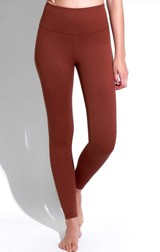 Front view of the Avocado Mid Rise Phoenix Fire Legging in Rust