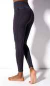 Close up of the Avocado Mid Rise Phoenix Fire Legging in Charcoal