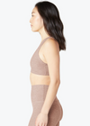 Side view of the Beyond Yoga Spacedye Lift Your Spirits Bra in Chai