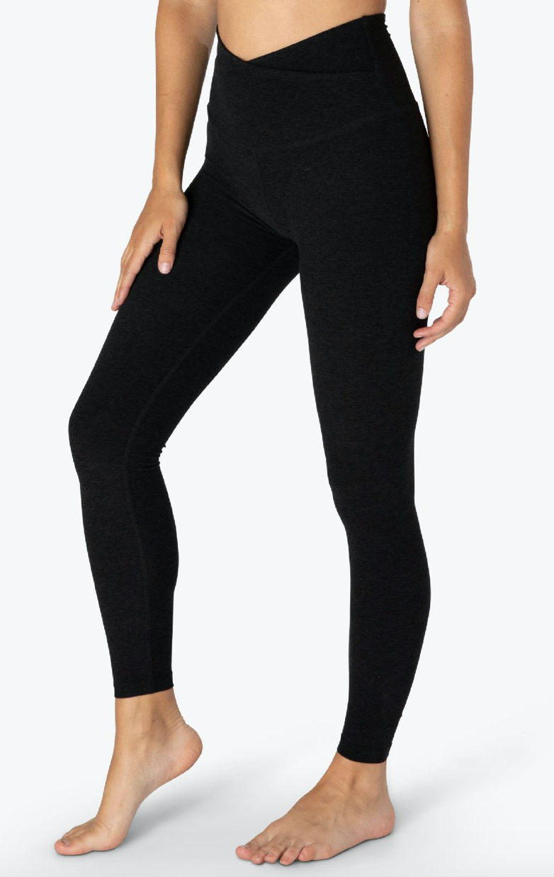 Side view of the Beyond Yoga Spacedye At Your Leisure High Waisted Midi Legging in Darkest Night