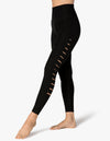 Side look at the Beyond Yoga So Slashed High Waisted Midi Legging